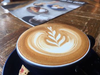 High angle view of cappuccino on table