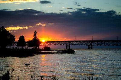 Scenic view of sunset over river