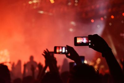 People photographing at night