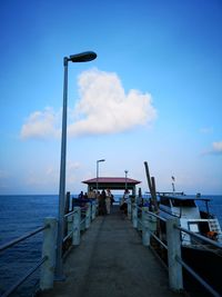 Pier over sea against sky
