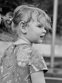 Close-up of boy looking away