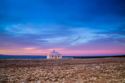 View of beach at sunset