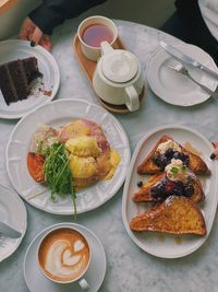 High angle view of breakfast served on table