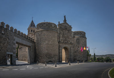 Puerta de bisagra or alfonso vi gate in city of toledo, spain