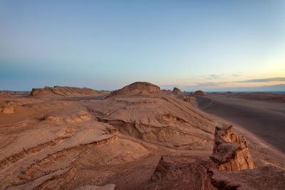 Scenic view of desert against sky