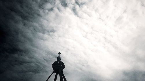 Low angle view of bird against sky