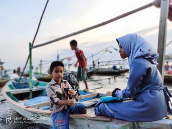 People on boat in water