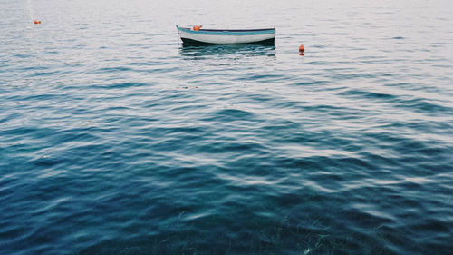 High angle view of boat sailing in sea