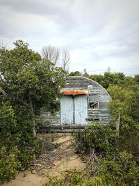 House on field against sky