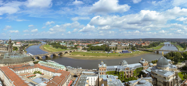 High angle view of buildings in city against sky