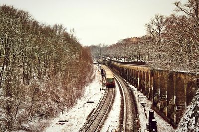 High angle view of train by trees during winter