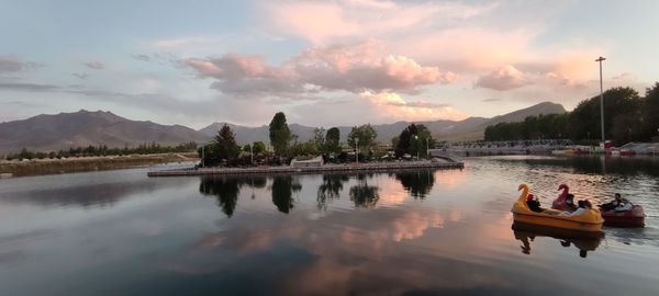 Scenic view of lake against sky during sunset