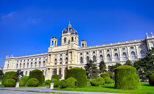 Low angle view of building against blue sky