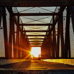 Metal bridge against sky