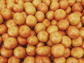 Full frame shot of oranges for sale at market