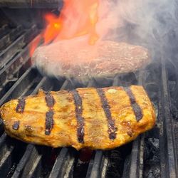 Close-up of meat on barbecue grill