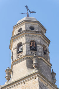 Low angle view of building against clear blue sky
