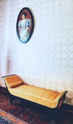 Table and chairs on wall at home