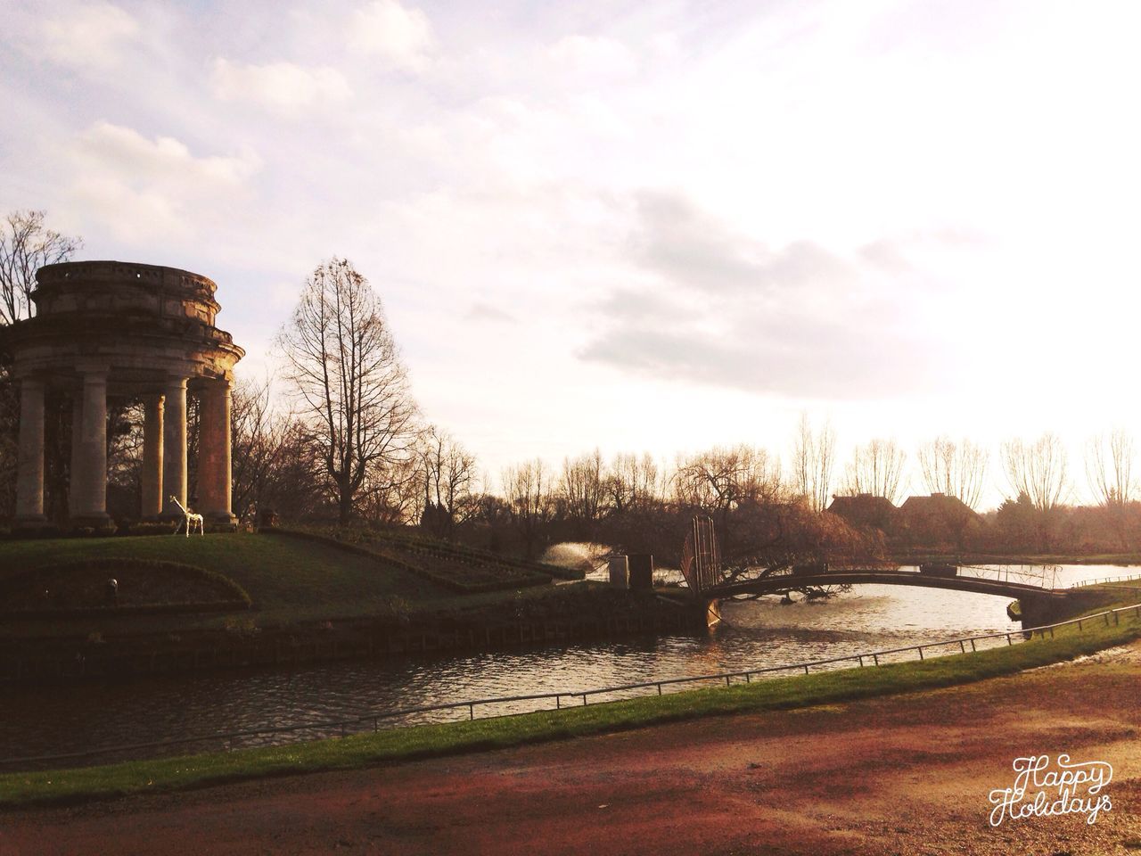 RIVER WITH BUILDINGS IN BACKGROUND