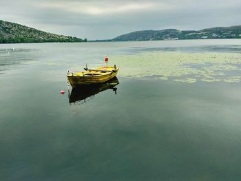 Boat on sea against sky