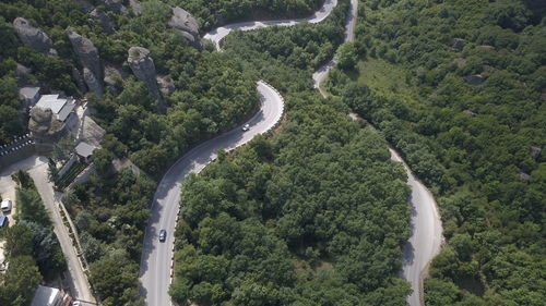 High angle view of road amidst trees in forest