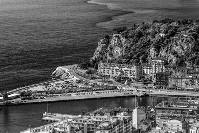 High angle view of townscape by sea