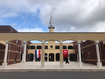 National flags of turkey and the netherlands hanging from a new mosque in the netherlands