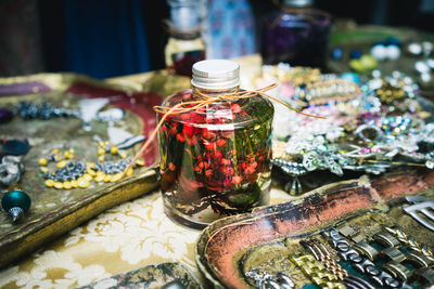 Close-up of multi colored jar on table