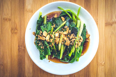 High angle view of salad in bowl on table