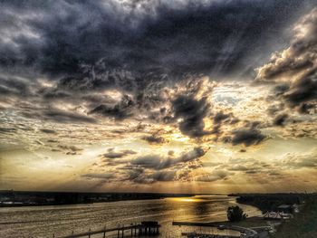 Scenic view of sea against dramatic sky