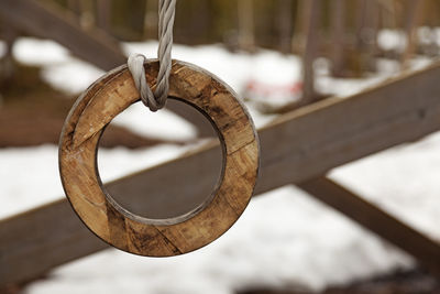 Close-up of chain hanging on rope