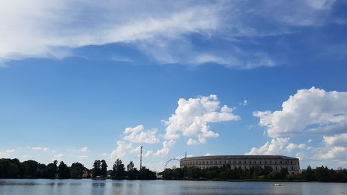 View of calm lake against blue sky