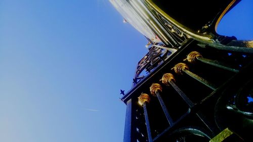 Low angle view of building against clear blue sky