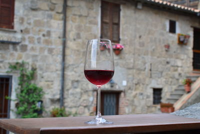 Close-up of wineglass on table