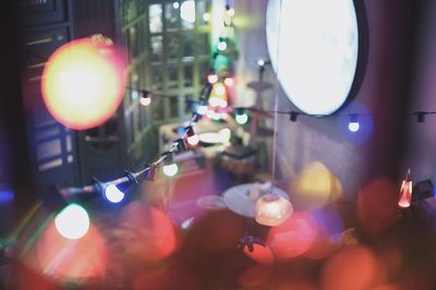 Close-up of illuminated lights on window