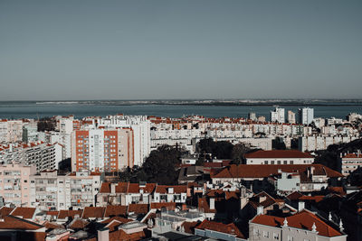 Panoramic view of lisbon from above: buildings, tagus river