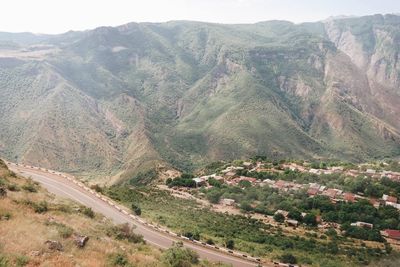 High angle view of road amidst landscape and mountains