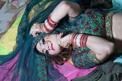 High angle portrait of beautiful woman wearing traditional clothing and jewelries