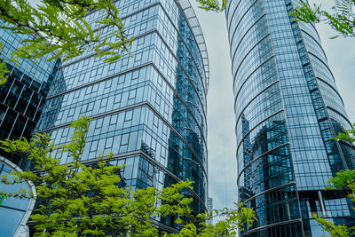 Low angle view of modern buildings in city