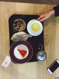 Directly above shot of woman having food