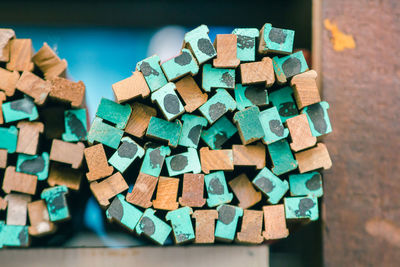 High angle view of multi colored candies on wooden table