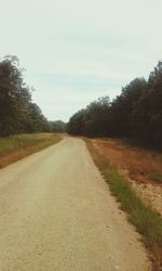 Country road passing through landscape