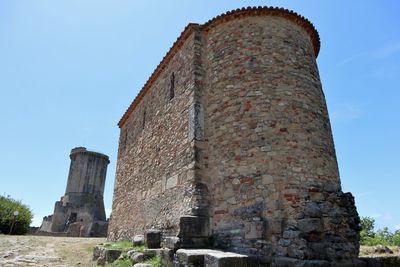 Low angle view of old building against sky