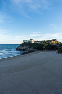 Scenic view of beach against sky