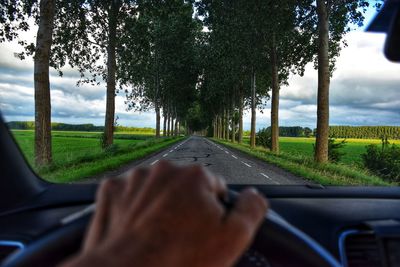 Road seen through car windshield