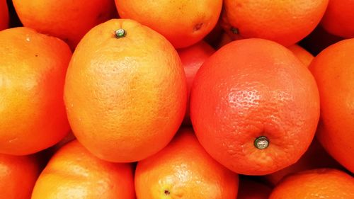 Full frame shot of oranges in market