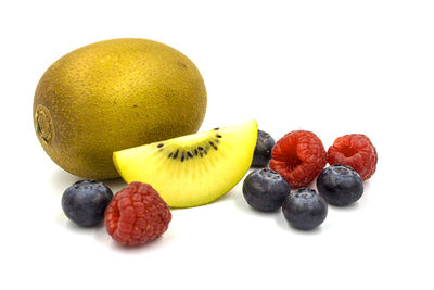 Close-up of fruits against white background