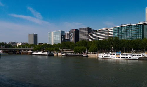 Boats in sea against sky