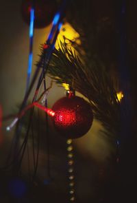 Close-up of illuminated lights at night