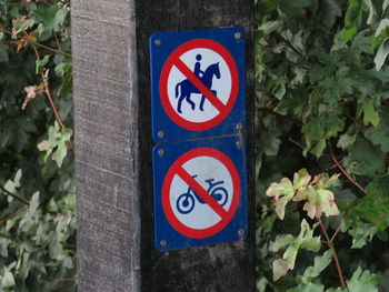 Close-up of warning sign on road